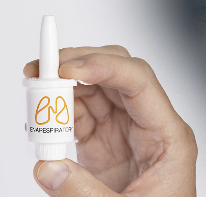 Hand holds nasal spray medicine delivery device
